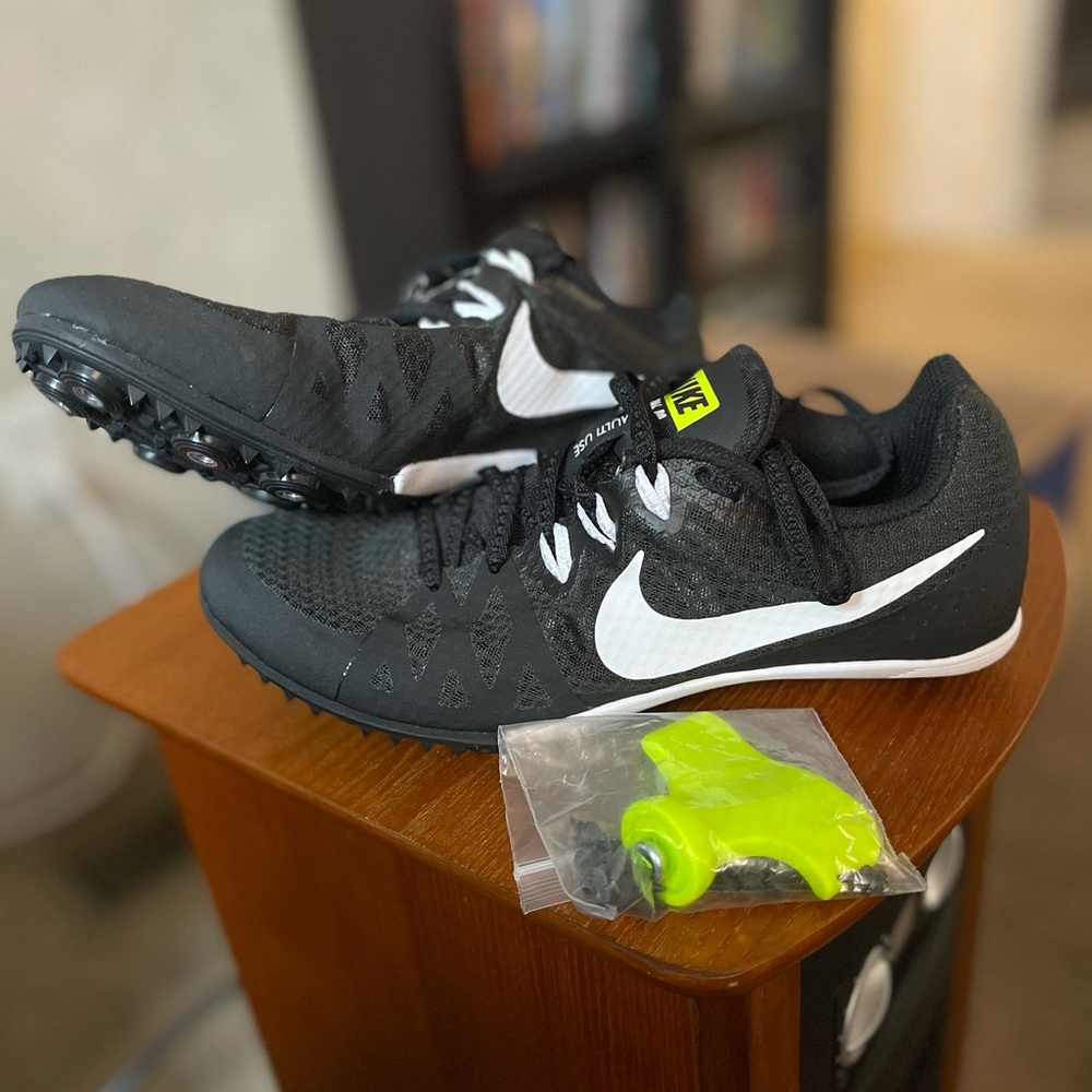 Brand new Nike track and field spike shoes